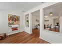 Open living area boasting hardwood floors, decorative wall features, and seamless flow at 1419 30Th N Ave, St Petersburg, FL 33704