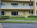 Charming condo exterior with lovely balcony and well-maintained landscaping at 2221 Norwegian Dr # 15, Clearwater, FL 33763