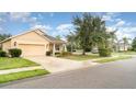 Attractive one-story home with well-kept lawn, two-car garage and pleasant landscaping at 11849 Forest Park Cir, Bradenton, FL 34211