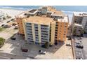 Aerial view of this gorgeous building with views of the ocean at 18610 Gulf Blvd # 208, Indian Shores, FL 33785