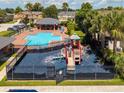 Enjoy the community pool, playground, and other amenities, perfect for Gathering fun and relaxation in the sun at 2007 Searay Shore Dr, Clearwater, FL 33763