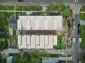 Aerial view of modern townhomes featuring rooftop patios, fresh landscaping, and convenient street access at 2120 4Th S St, St Petersburg, FL 33705