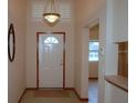 Inviting foyer with neutral walls and tile flooring at 2784 Alexander Dr, Clearwater, FL 33763