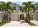 Inviting townhome with a two-car garage and meticulously maintained landscaping at 4504 Silver Lining St, Sarasota, FL 34238