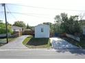 Charming single-story home featuring a well-maintained front yard and convenient double driveway at 5824 Coventry Dr, Tampa, FL 33615