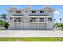 Beautiful multi-Gathering home with garages, balconies, and well maintained yard at 601 2Nd St, Indian Rocks Beach, FL 33785