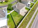 Aerial view of the property showcasing the backyard, patio, and surrounding neighborhood at 8806 Bayaud Dr, Tampa, FL 33626