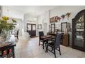 Spacious living area with dining table, chess set, decor, and an inviting ambiance at 19104 Cellini Pl, Lutz, FL 33558