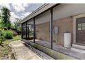 Enclosed patio with access to yard at 4479 Newark N St, St Petersburg, FL 33714