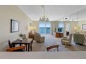 Comfortable living space with view, neutral decor, and an inviting open floor plan at 7932 Sailboat Key S Blvd # 406, South Pasadena, FL 33707