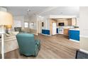 Inviting open floor plan living space with a combined kitchen and sitting area at 2011 Ketch Cir, Palm Harbor, FL 34683