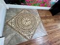 Elegant tile flooring design, adding a touch of sophistication to the condo's entryway at 1025 82Nd N Ter # 1025D, St Petersburg, FL 33702