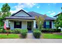 Inviting single-story home featuring a well-manicured lawn and tidy landscaping at 12862 Rangeland Blvd, Odessa, FL 33556