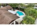 Relaxing backyard pool and patio area perfect for entertaining guests or enjoying time outdoors at 13501 Avista Dr, Tampa, FL 33624
