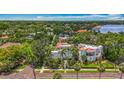 Stunning aerial view showcases the property's proximity to the water and lush landscaping at 301 23Rd Ne Ave, St Petersburg, FL 33704
