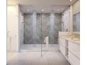 Spa-like bathroom with a double shower, herringbone tile, and contemporary vanities at 400 Central Ave # 808, St Petersburg, FL 33701