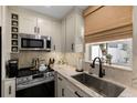 Beautiful kitchen with updated appliances, ample counter space, and a window view at 4214 Harbor House Dr, Tampa, FL 33615