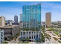 Modern high-rise condo with glass windows, and city views on a bright and sunny day at 777 N Ashley Dr # 2510, Tampa, FL 33602