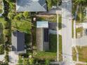 An aerial view of a single Gathering home on a tree lined street, showing roof and property boundaries at 2501 18Th S Ave, St Petersburg, FL 33712