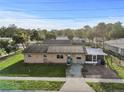 Lovely single story home with solar panels, screened in porch and fenced yard at 2501 18Th S Ave, St Petersburg, FL 33712
