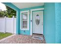 Close-up of the entryway with a decorative door and a welcome mat at 2715 Bel Aire Cir, Tampa, FL 33614