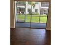 View from the patio showcases well-maintained lawn and neighboring buildings, bringing the outdoors in at 337 S Mcmullen Booth Rd # 157, Clearwater, FL 33759