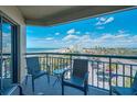 Relax on this balcony with comfortable seating and enjoy amazing views of the beach and ocean at 4510 Gulf Blvd # 604, St Pete Beach, FL 33706