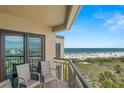 Breathtaking ocean views from the private balcony with comfortable seating, perfect for enjoying the scenery at 4510 Gulf Blvd # 604, St Pete Beach, FL 33706
