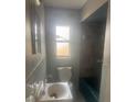 Bathroom featuring a classic tile and fixtures at 5211 E 17Th Ave, Tampa, FL 33619
