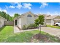 Charming one-story home featuring a well-maintained lawn and inviting curb appeal at 6801 Summer Cove Dr, Riverview, FL 33578