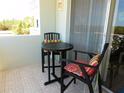 Balcony with outdoor seating to enjoy the views of the surrounding area at 9 Forbes Pl # 310, Dunedin, FL 34698