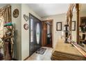 Inviting foyer with tiled flooring, decorative accents, and a glimpse into the adjacent room, creating a warm and welcoming entrance at 159 Canby Cir, Spring Hill, FL 34606