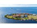 Waterfront properties with private docks line the coast, offering stunning views and direct water access at 26 Harborpointe Dr, Port Richey, FL 34668