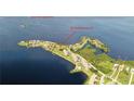Aerial view of 26 Harborpointe Dr waterfront homes on a scenic peninsula with a gulf view at 26 Harborpointe Dr, Port Richey, FL 34668
