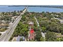 Beautiful aerial view shows the neighborhood with stunning waterfront views; a short drive to the beach at 7705 4Th W Ave, Bradenton, FL 34209