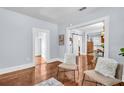 Bright living room with gleaming hardwood floors and an open floor plan for versatile living at 844 10Th S Ave, St Petersburg, FL 33701