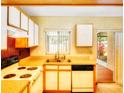 Efficient kitchen layout with a double sink and plenty of cabinet space at 1907 Fluorshire Dr, Brandon, FL 33511