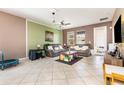 Bright living room with tiled floors and a relaxing atmosphere at 11711 Winterset Cove Dr, Riverview, FL 33579
