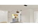 Bright living area features a kitchen pass-through at 1206 10Th Se Cir, Largo, FL 33771