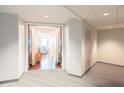 View of the hallway showing the entrance to a bright and inviting living area at 1209 E Cumberland Ave # 1003, Tampa, FL 33602