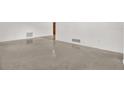 Open living area with white walls and tile flooring at 13795 Antigua Dr, Seminole, FL 33776