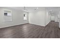 Bright and spacious bedroom with hardwood floors, recessed lighting, and ample natural light at 5707 N 20Th St, Tampa, FL 33610