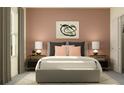 Stylish bedroom featuring a comfortable bed with decorative pillows, complemented by bedside tables and modern lamps at 10857 Rustic Eve Ct, Land O Lakes, FL 34638