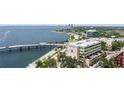 Amazing waterfront view featuring a bridge, the bay, commercial buildings and Tampa skyline in the distance at 345 Bayshore Blvd # 1807, Tampa, FL 33606