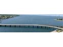 Scenic water view featuring a bridge, bay and waterfront homes with blue skies from the condo at 345 Bayshore Blvd # 1807, Tampa, FL 33606