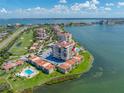 Waterfront condominium complex featuring stunning bay views and a community pool at 6372 Palma Del Mar S Blvd # 601, St Petersburg, FL 33715