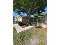 Charming single-story home with mature landscaping and a cozy front entrance at 8804 Lido Ln, Port Richey, FL 34668
