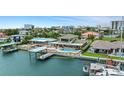 Waterfront property with pool, boat dock and sweeping city views at 333 Midway Is, Clearwater Beach, FL 33767