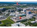 An aerial view of the complex near stadium, businesses and residential area at 4221 W Spruce St # 2218, Tampa, FL 33607