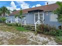 Inviting exterior showcasing a well-maintained facade and charming porch at 703/709 Patterson St, Clearwater, FL 33756